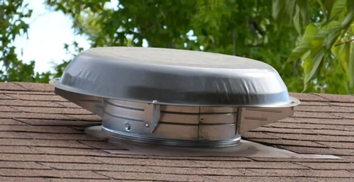 attic fan installation services with low-profile roof ventilation unit in New Orleans, LA