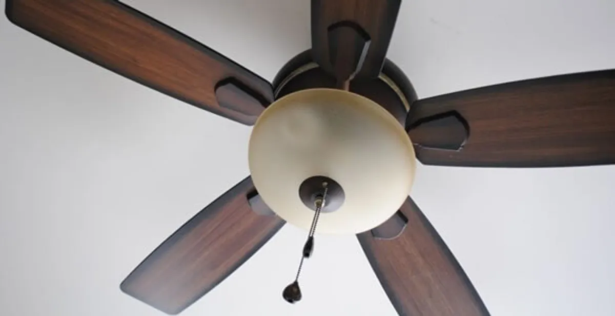 Fully installed ceiling fan with balanced blades and light fixture in New Orleans, LA
