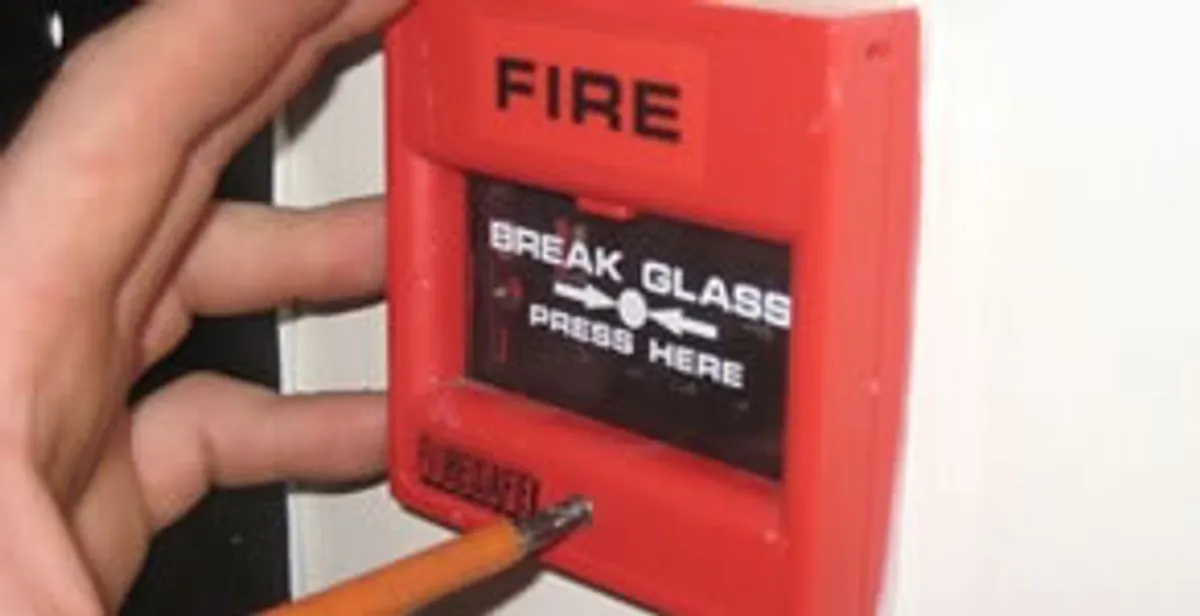 fire alarm installation service showing manual fire alarm pull station installed by licensed electricians in New Orleans, LA