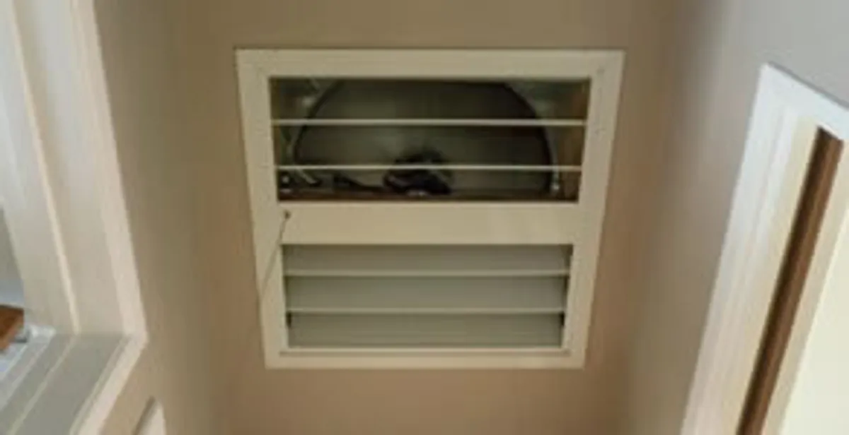 whole house fan installation services with ceiling-mounted ventilation system in New Orleans, LA